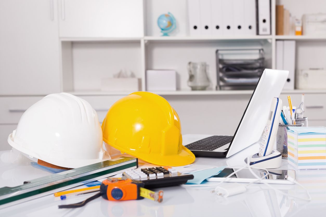 Instruments for building near the laptop lying in the modern workplace